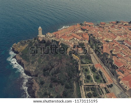 Panoramic views of villa Napoleon and the lighthouse of Portoferraio Elba island, Italy. Toned picture.