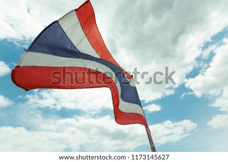 thai flag sky background and beautiful clouds blowing by the wind