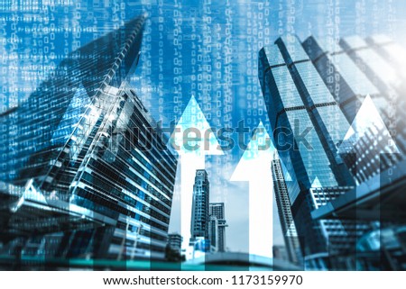 the abstract image of the skyscraper image overlay with business chart and binary code image. the concept of accounting, technology, economy and programmer.