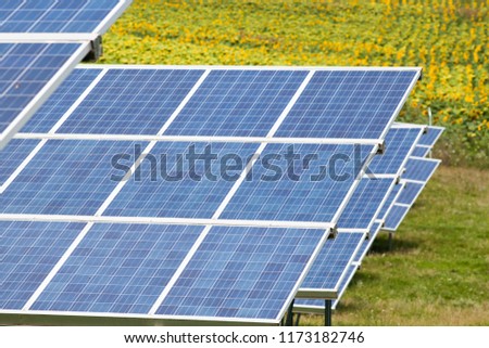 solar panels with the sunny sky. Blue solar panels. background of photovoltaic modules for renewable energy.