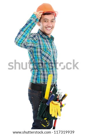 Portrait of young happy construction worker on white background