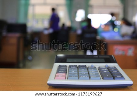 Close-up of calculator on office desk selective focus and shallow depth of field