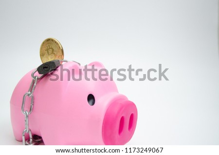 Piggy Bank Pink and cyber coins and banknotes on white.Save and make a better lifestyle​ concept.Do not focus on objects.