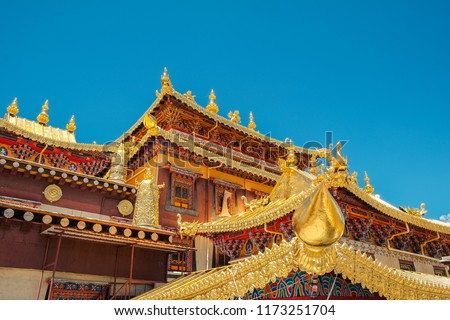the roof architecture of Songzanlin Temple also known as the Ganden Sumtseling Monastery, is a Tibetan Buddhist monastery in Zhongdian city( Shangri-La), Yunnan China. Royalty-Free Stock Photo #1173251704