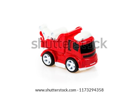 Red fire truck toy isolated on white background