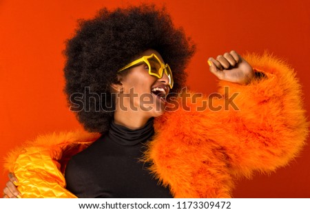 Beautiful african woman studio portraits, concept about lifestyle and beauty Royalty-Free Stock Photo #1173309472