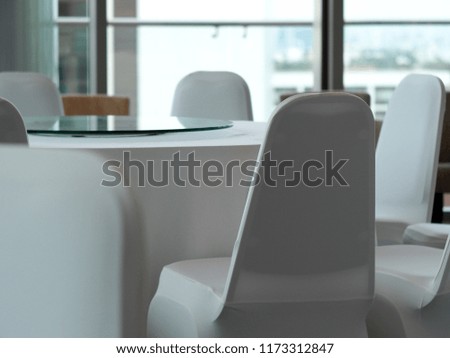 canteen lounge seat chair in modern minimal loft style house crop closeup with large glass window background for semi casual business environment style backdrop background use