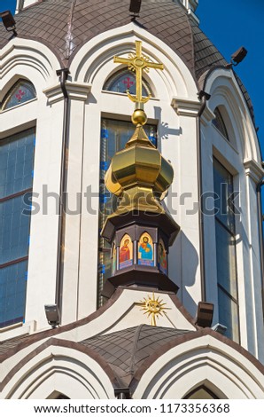 Domes of orthodox church against the blue sky in early spring