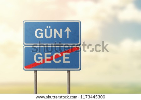day and night - blue road sign with inscriptions in Turkish