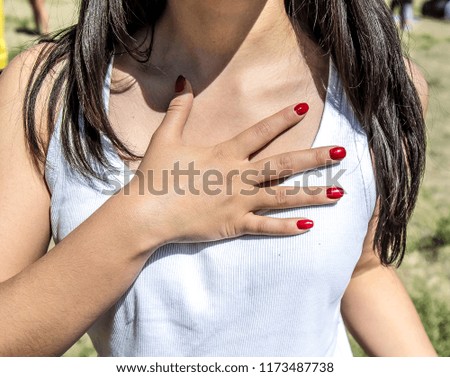 Girl with red manicure