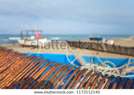 The inside view of an old fishing boat on the beach