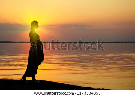 Pregnant woman on beach outdoor. Nature background. Love concept