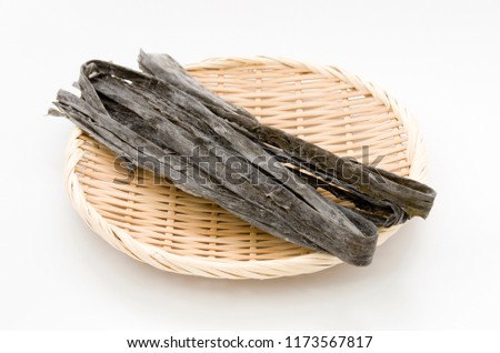 Dried kombu seaweed Japanese dry kelp on a bamboo sieve