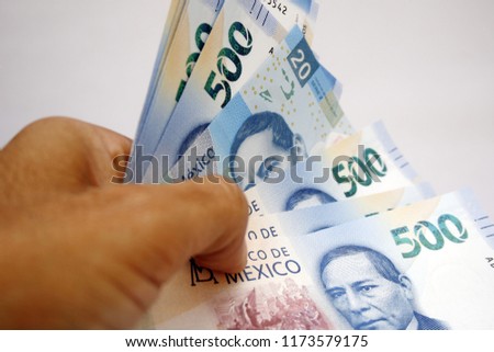 Mexican bills of 500 and 20 pesos, with white background