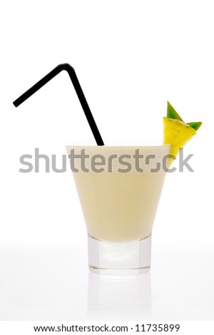 A glass of Pina Colada Cocktail with a straw and a piece of pineapple Royalty-Free Stock Photo #11735899