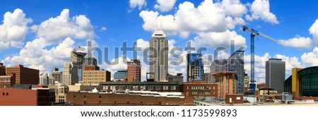 A panoramic of Indianapolis, IN on a sunny afternoon.
