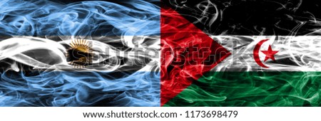 Argentina vs Sahrawi smoke flags placed side by side. Thick colored silky smoke flags of Argentinian and Sahrawi
