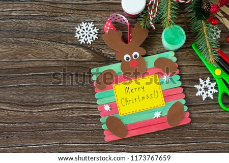Santa and Reindeer stick gift. Handmade. Project of children's creativity, handicrafts, crafts for kids.