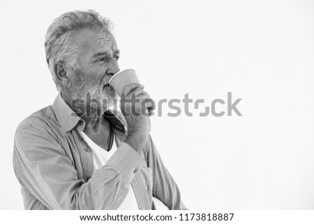 portrait senior man drinking hot coffee looking vision future concept with space for text
