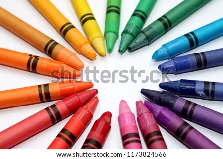 A set of colorful pencils on a white background