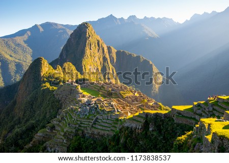 Sunrise on Machu Picchu, the lost city of inca Royalty-Free Stock Photo #1173838537