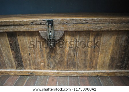 Old wooden chest with closed lit