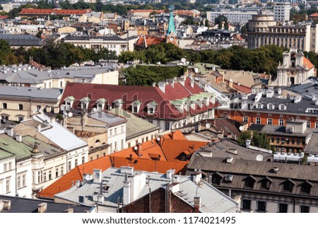 Roofs of medieval buildings in Krakow Old Town top View warm toned