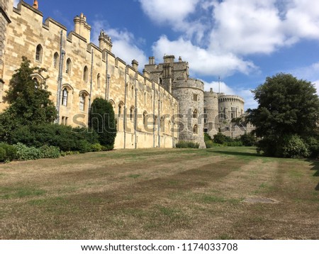 Windsor Castle and grounds in the historic town of Windsor on the River Thames, a residence of the British Royal Family, a venue for hosting state visits and a popular English tourist attraction