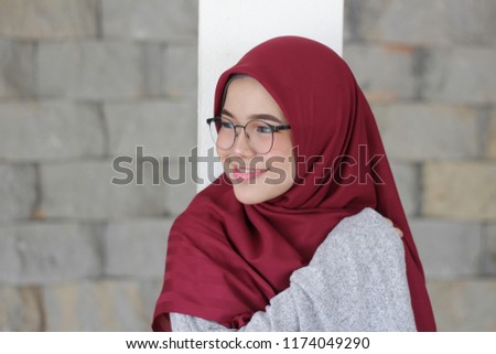 close up portraiture of cute girl wearing hijab. face expressions.