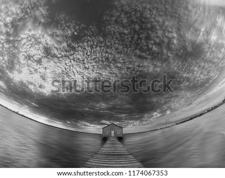 fisheye black and white clouds water shed
