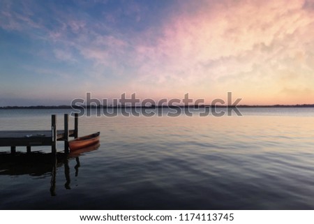 Canoe in a lake, Soft blurry in sunrise and sunset time, Of free for your space and branding.
