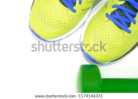 Propositos September and December. Go to the gym. sport sneakers and dumbbells on white background. Do sport. Healthy lifestyle. Lose weight. horizontal and vertical pictures. Different colors of spor