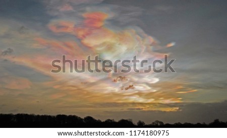 Hessay, York, England UK, February 2nd 2016 Nacreous Clouds (also known as Polar Stratospheric cloud and mother of pearl clouds) as seen from Hessay Yorkshire Royalty-Free Stock Photo #1174180975