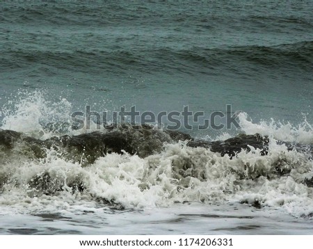 Waves with a lot of white foam