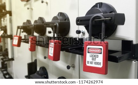 Lock out & Tag out , Lockout station,machine - specific lockout devices and safety first point Royalty-Free Stock Photo #1174262974