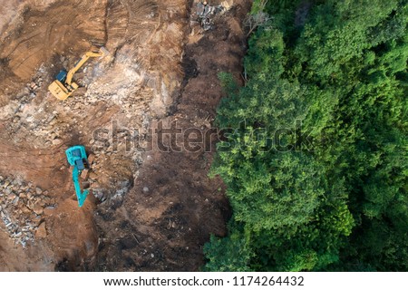 Deforestation aerial photo. Rainforest jungle in construction road site