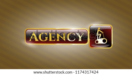  Golden emblem or badge with stationary bike icon and Agency text inside