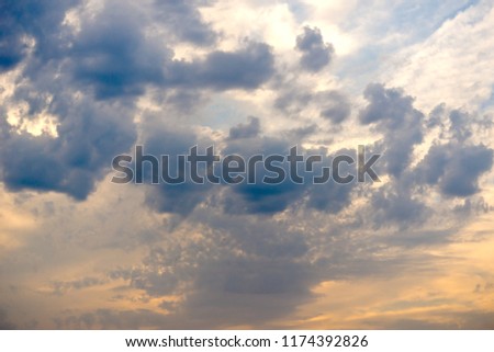 Sunset sky with blue clouds