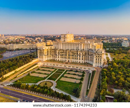 Parliament building or People's House in Bucharest city. Aerial view at sunset Royalty-Free Stock Photo #1174394233