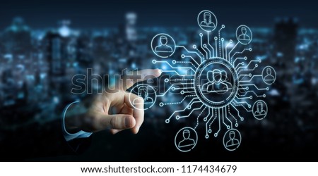 Businessman on blurred background using thin line social network icons interface