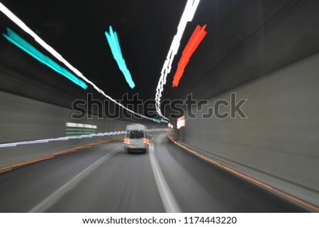 Driving inside the tunnel with motion blur background.

Location: Italy