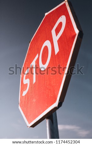 stop sign on background of blue sky