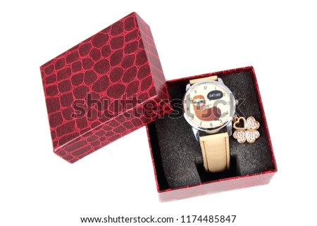 Red box with watches and image of sloth on it, on the white background.