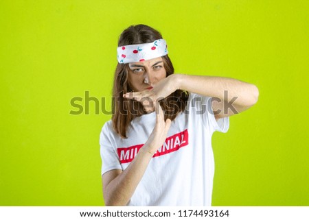 Person making loser sign
