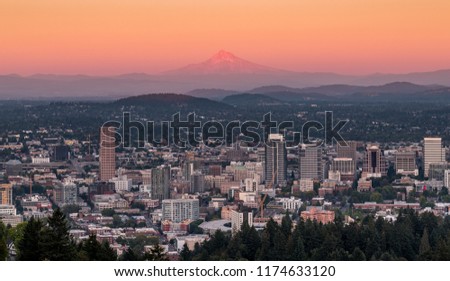 Sunset over the city of Portland Oregon with Mt Hood in the distance