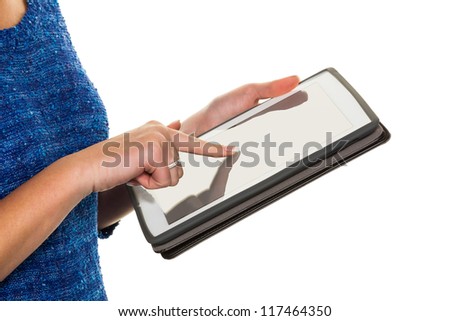 hands of a woman using a tablet computer. with modern electronics can communicate anytime and anywhere