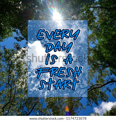 Motivational and inspirational quote - Everyday is a fresh start. With fresh green leaves in a forest framing the sun in the middle and forming rays of light background.
