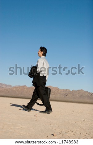 Businessman carrying his laptop case