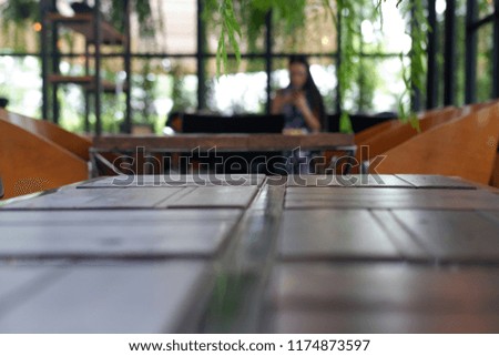 Cafe table wooden background and bokeh