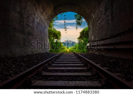 A People walking in Railway tunnel. Royalty-Free Stock Photo #1174883380